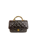 Chanel Shiny Lambskin Quilted Twisted Links Top Handle Flap bag